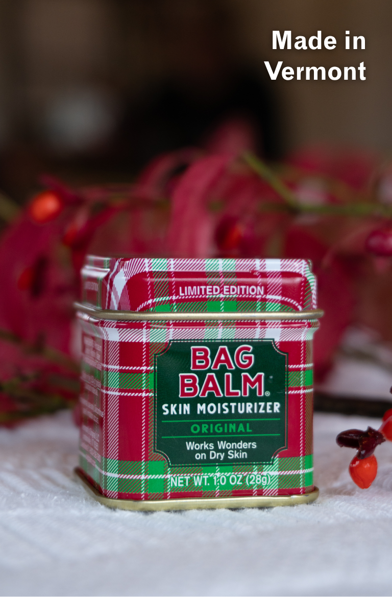 Red and green plaid tin of Bag Balm 1oz tin