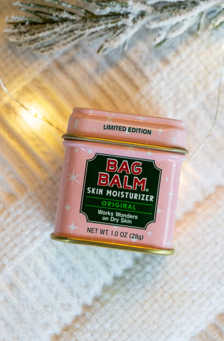 Pink with Stars Bag Balm 1oz Tin on white textured background