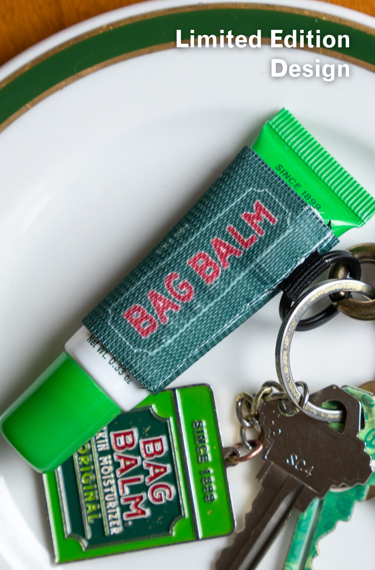 Bag Balm keychain on a white surface with 'Limited Edition Design' text.
