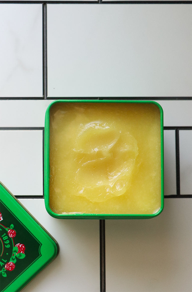 Open 8oz tin of Bag Balm