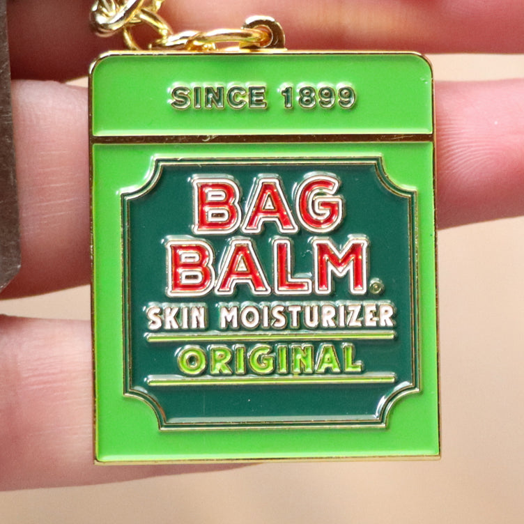 Keychain shaped like Bag Balm Mini Tin