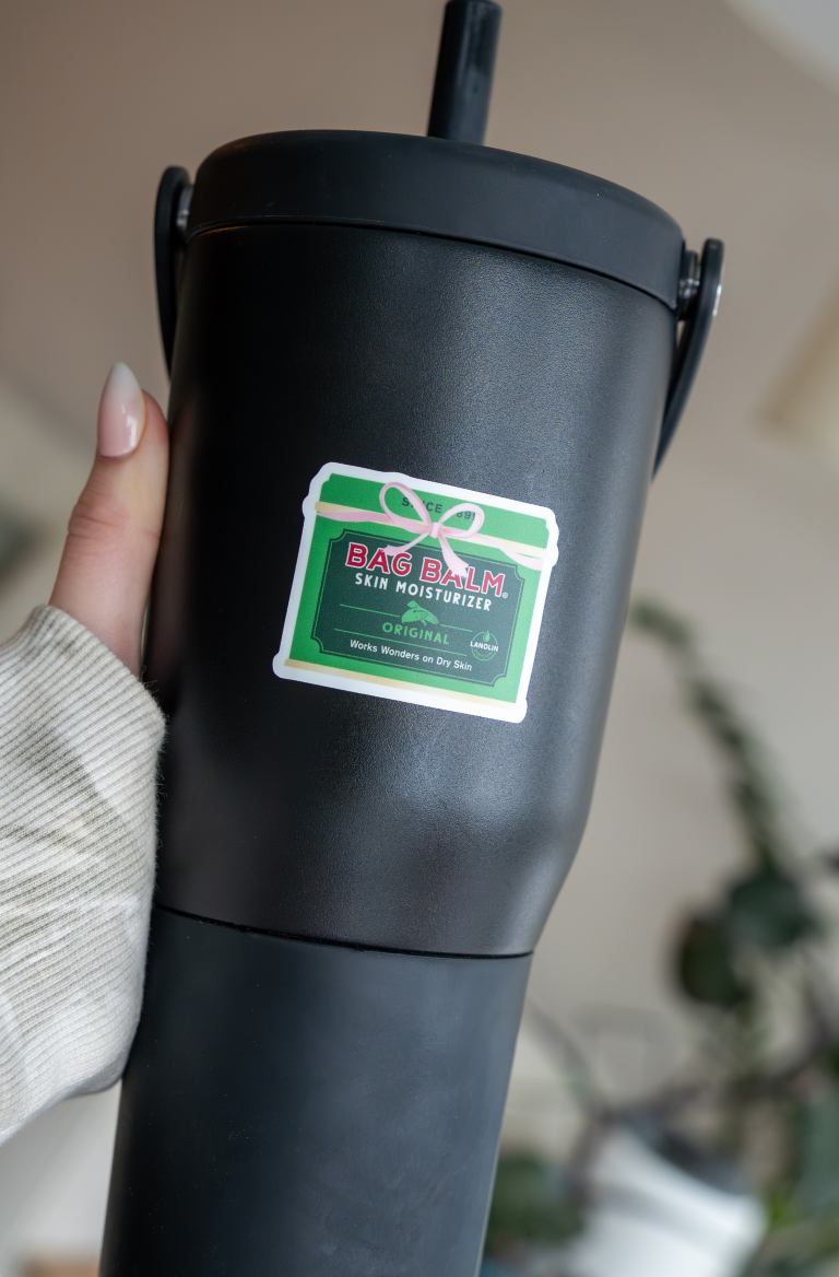 Black water bottle with a Bag Balm sticker