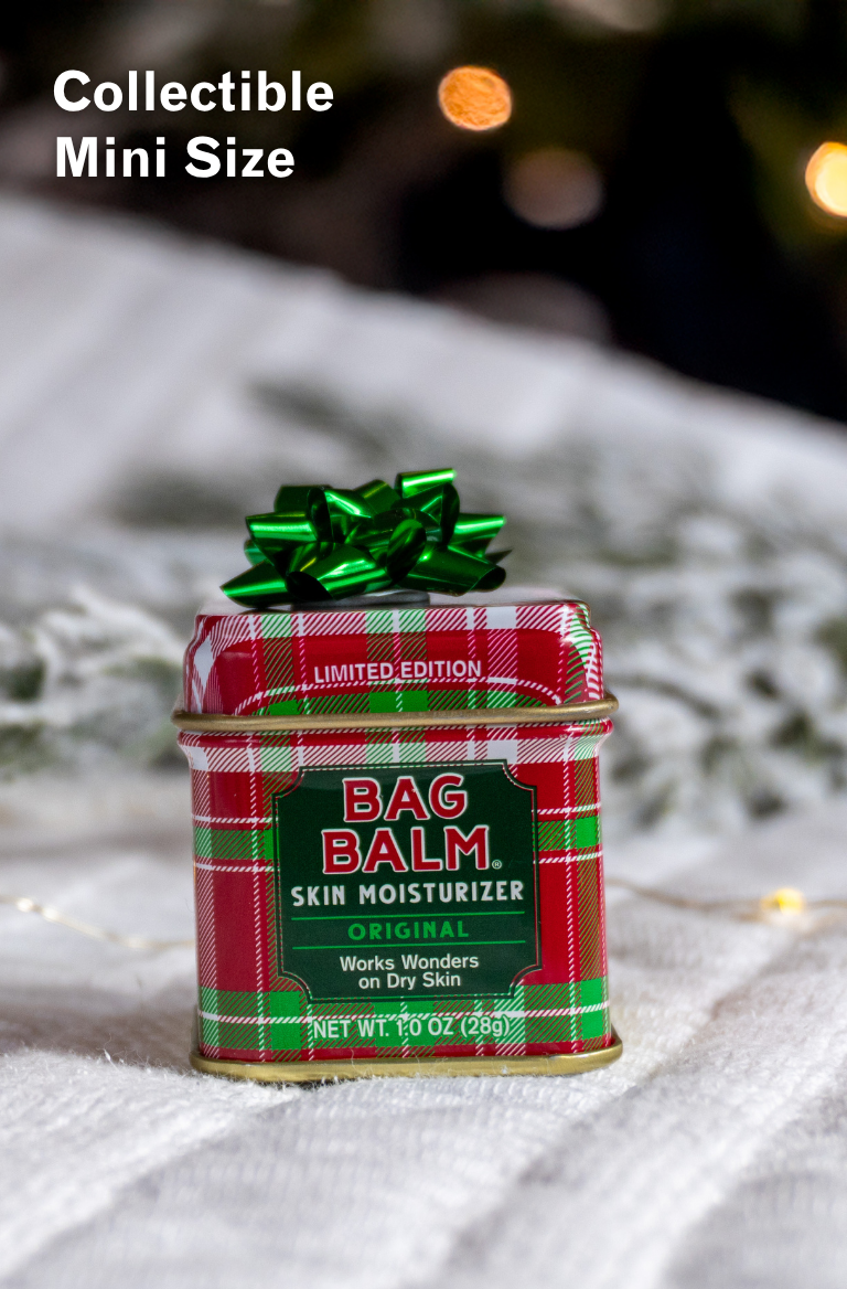 Red and green plaid tin of Bag Balm 1oz tin with a green bow
