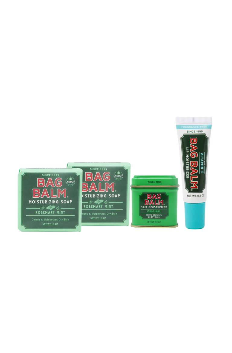 Travel Skincare Bundle Collection of Bag Balm products including soap, a lip balm tube, and a Bag Balm Original Formula Mini Tin
